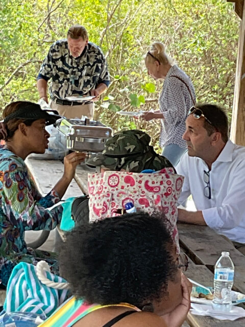 People enjoying a picnic at a park.